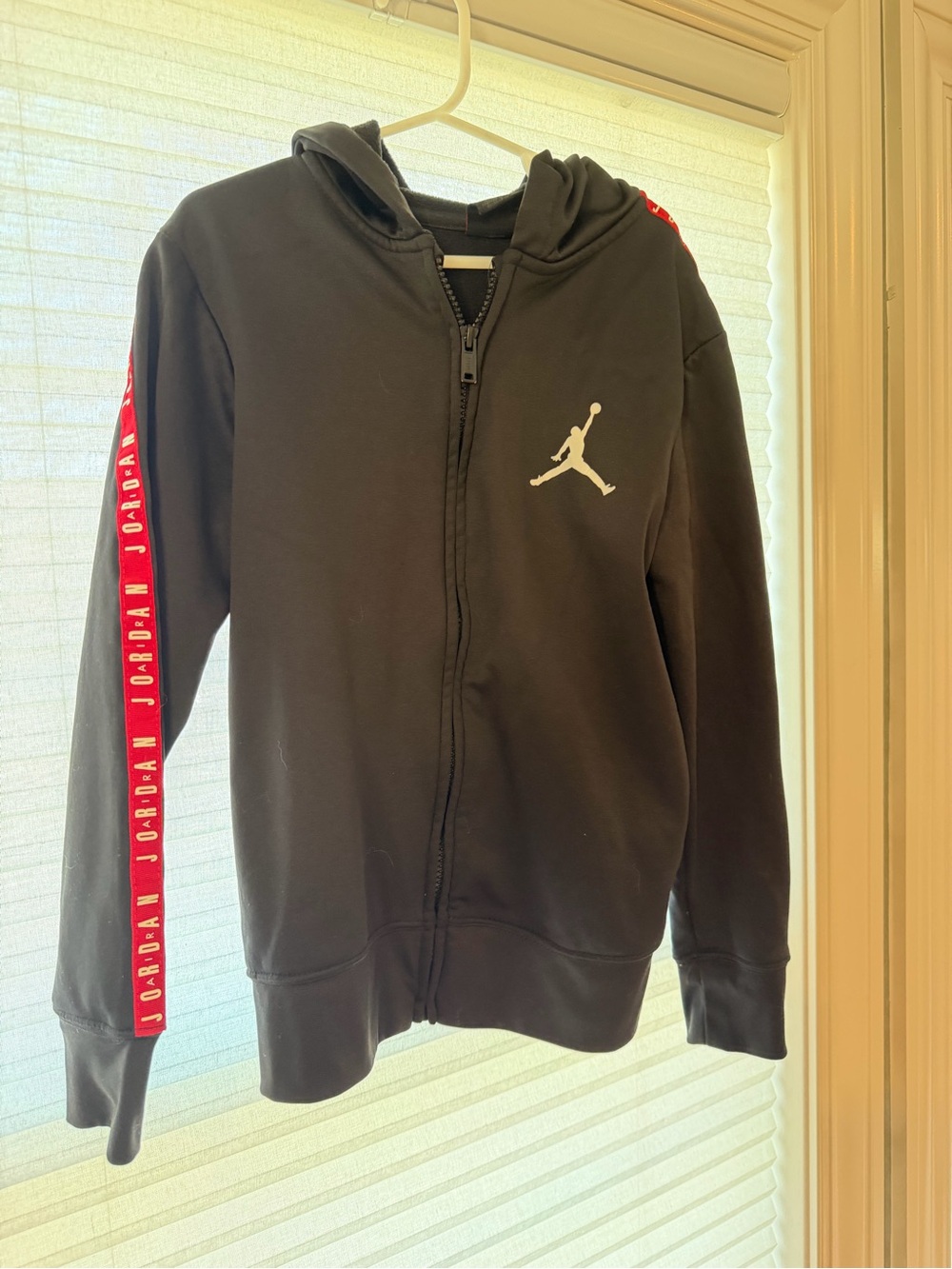 Jordan Black Zip Hoodie with White Jumpman and Red Sleeve Stripe